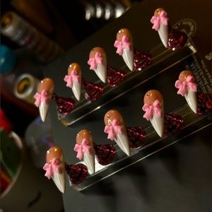 Stiletto Shaped Luxury Press ons Nails with Pink bows and rhinestone charm